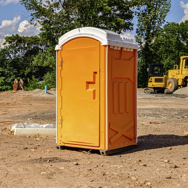 how often are the portable restrooms cleaned and serviced during a rental period in Fleming